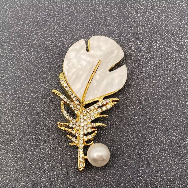 Rhinestone Feather Brooch: Silver