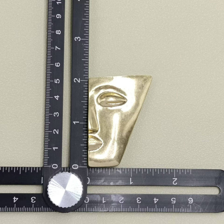 Vintage Half Face Brooch: Silver
